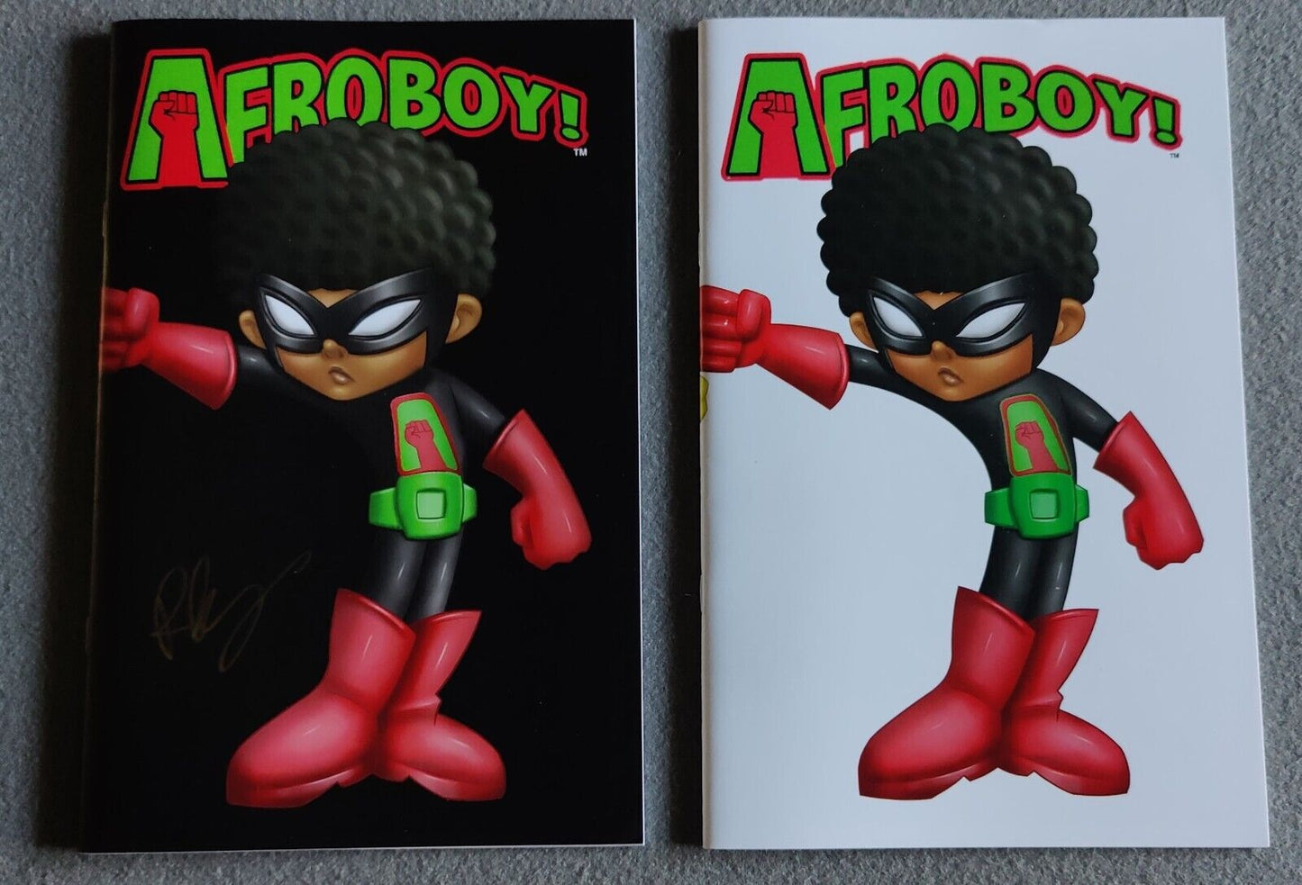 Afroboy and Puffgirl #1 White and RARE Black Cover VF/NM+ signed by Reggie Byers